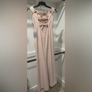 Blush floor length gown, side slit and bow detail on back